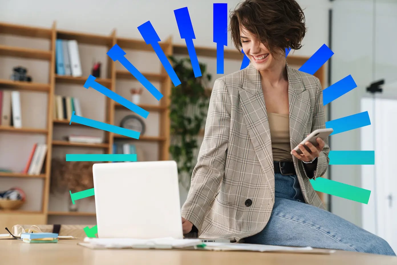 young businesswoman wearing jacket on laptop